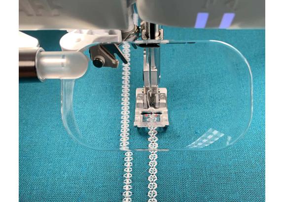 Small thumbnail view of Janome concealed invisible zipper attachment presser foot model.