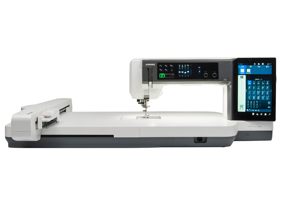 Janome Continental M17 computerized sewing and embroidery machine isolated on white.