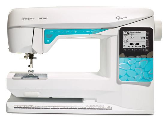 Husqvarna Viking Opal 670 computerized sewing machine isolated on a white background.