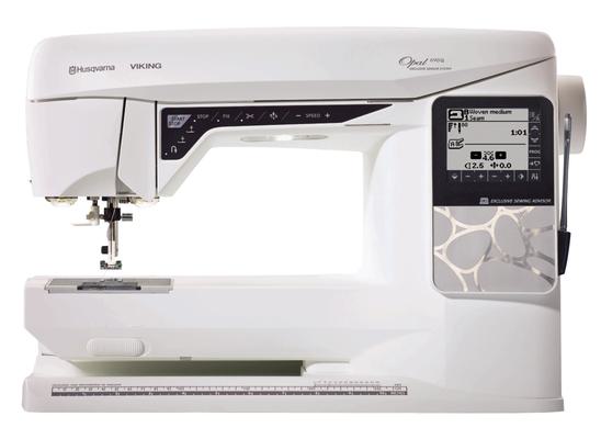 Husqvarna Viking Opal 690Q computerized sewing and quilting machine isolated on white.