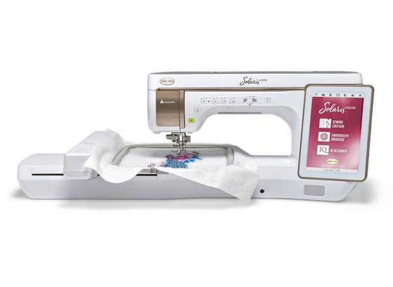 Baby Lock Solaris Vision premium computerized sewing and embroidery machine isolated on white.