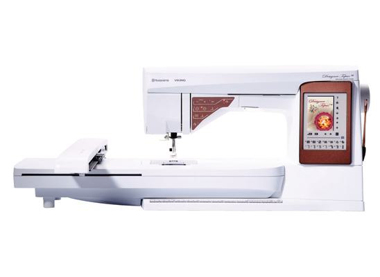 Husqvarna Viking Designer Topaz 50 sewing and embroidery machine isolated on a white background.