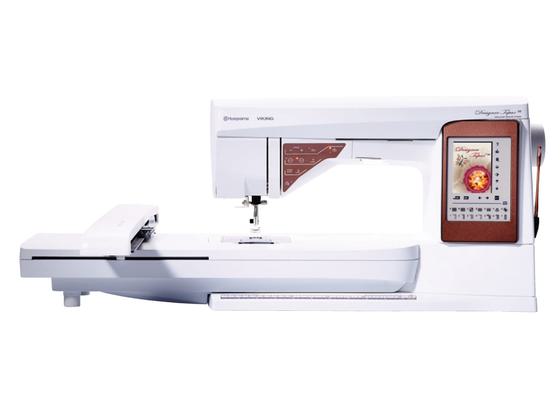 Husqvarna Viking Designer Topaz 50 sewing and embroidery machine isolated on a white background.